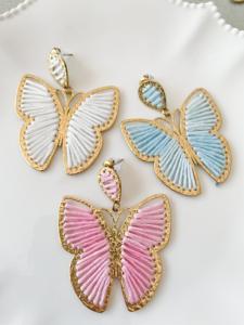 boucles papillon bleu doré